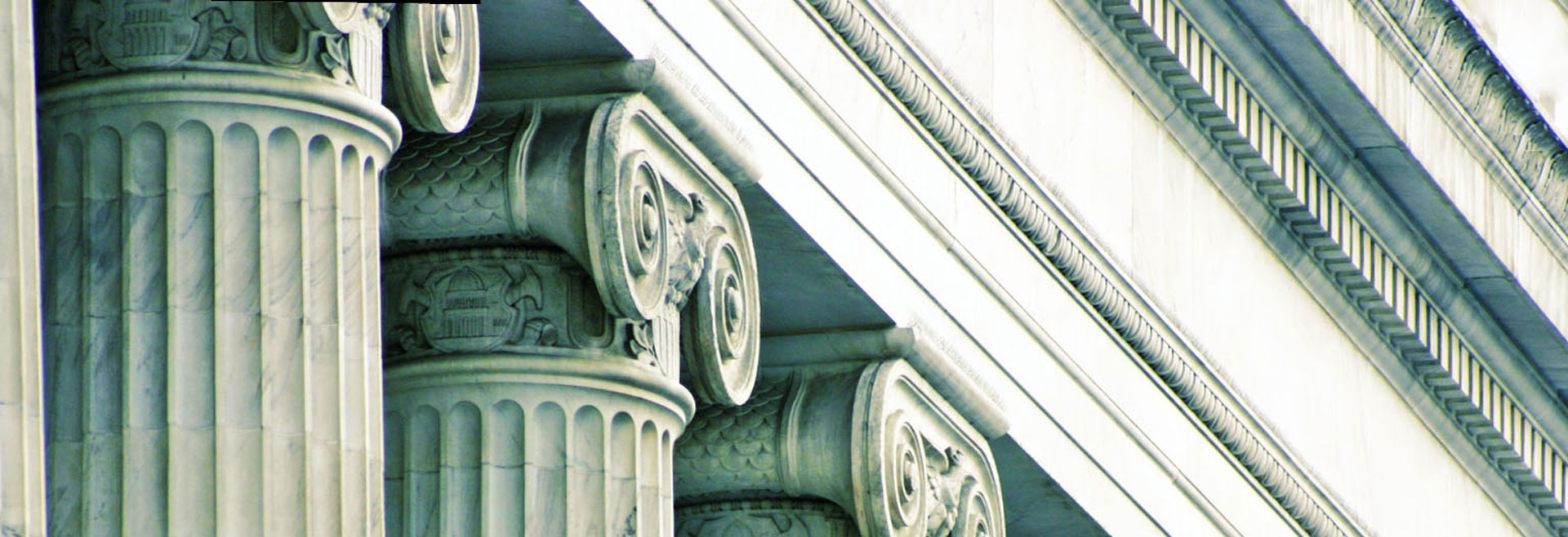 Classical courthouse columns representing the legal system